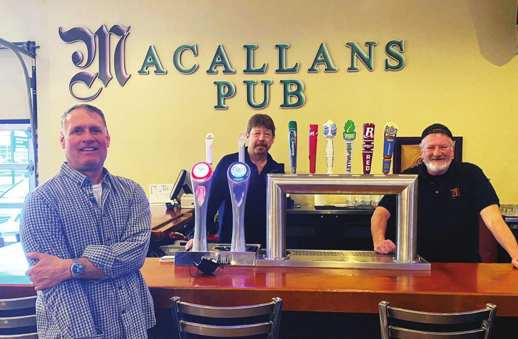 FROM LEFT, OWNER WAYNE BLUNT WITH STAFFERS TERRY SMITH AND DAVID MCKEE.
