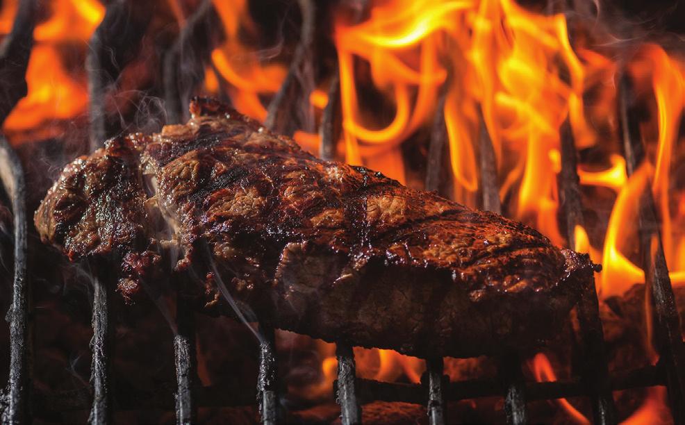 A sizzling steak on the grill at Al’s Steakhousein Ottawa