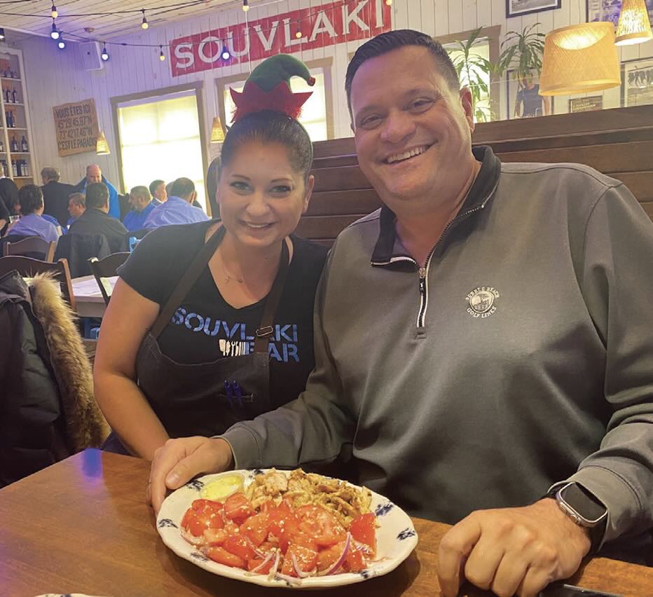 Peter Mammas is joined by server Maria at the Souvlaki Bar location in St. Laurent
