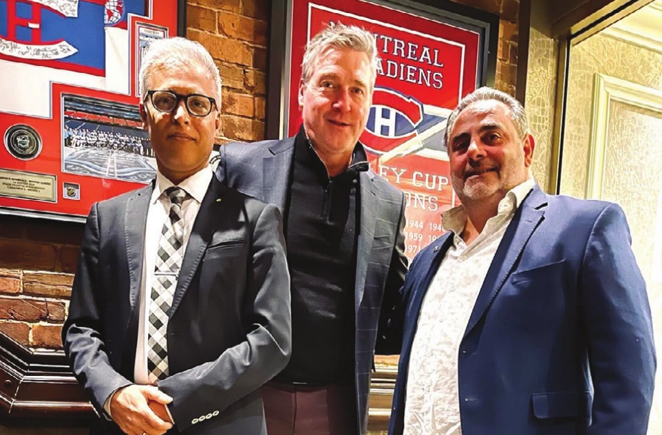 Partners Lavi Mainuddin (left) and Vincenzo Amodeo with celebrity guest Patrick Roy